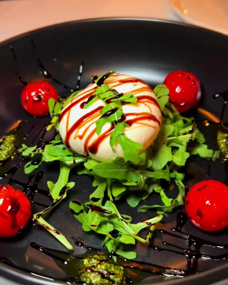 Burrata with arugula and cherry tomatoes